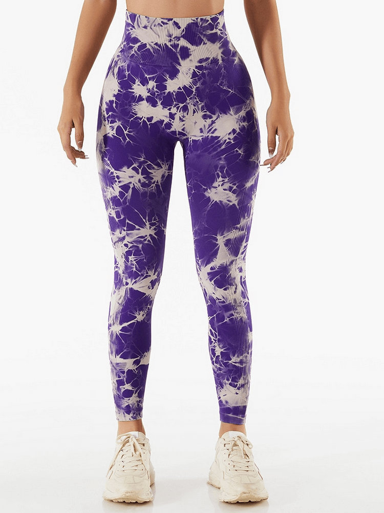 Purple tie-dye seamless high waist leggings for women's fitness, offering comfort and style for yoga and workouts.